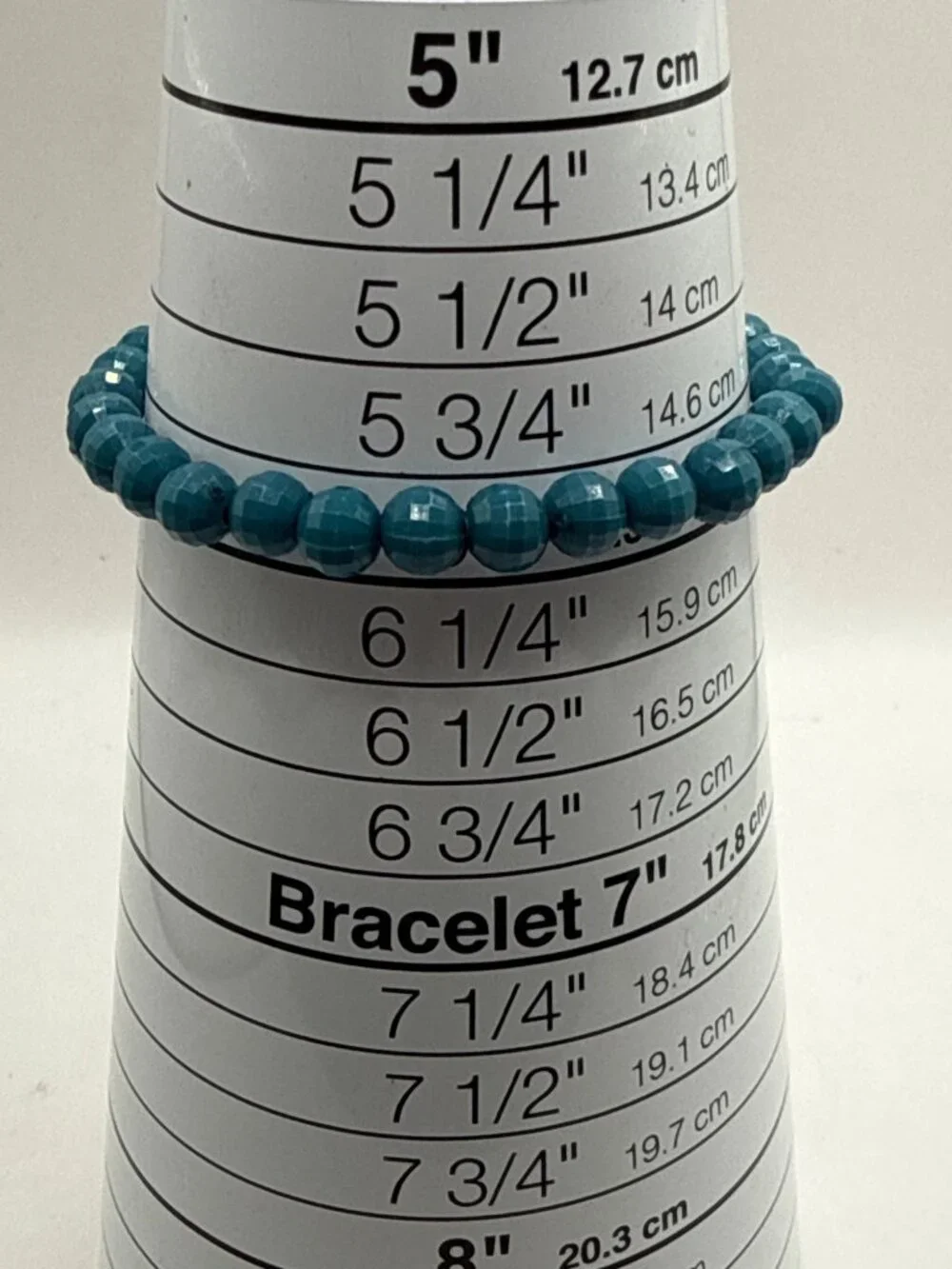Unbranded faceted teal